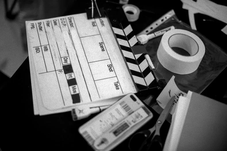 Film slates, clapperboards and tape