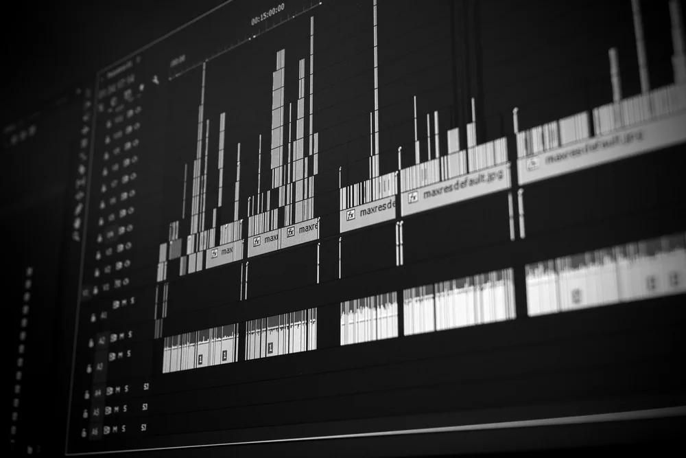 Video editing timeline on a dark monitor